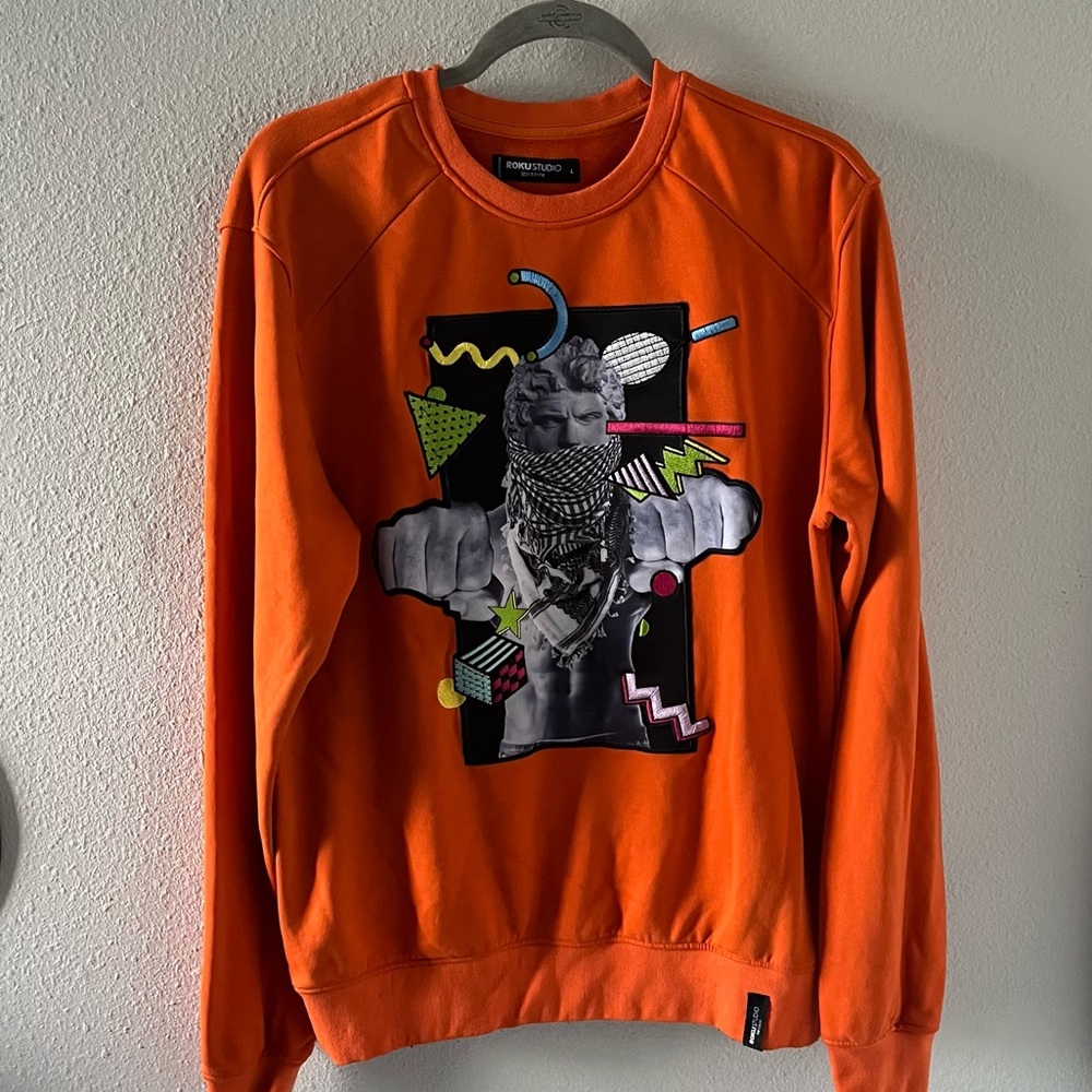 Orange crewneck like a champion
